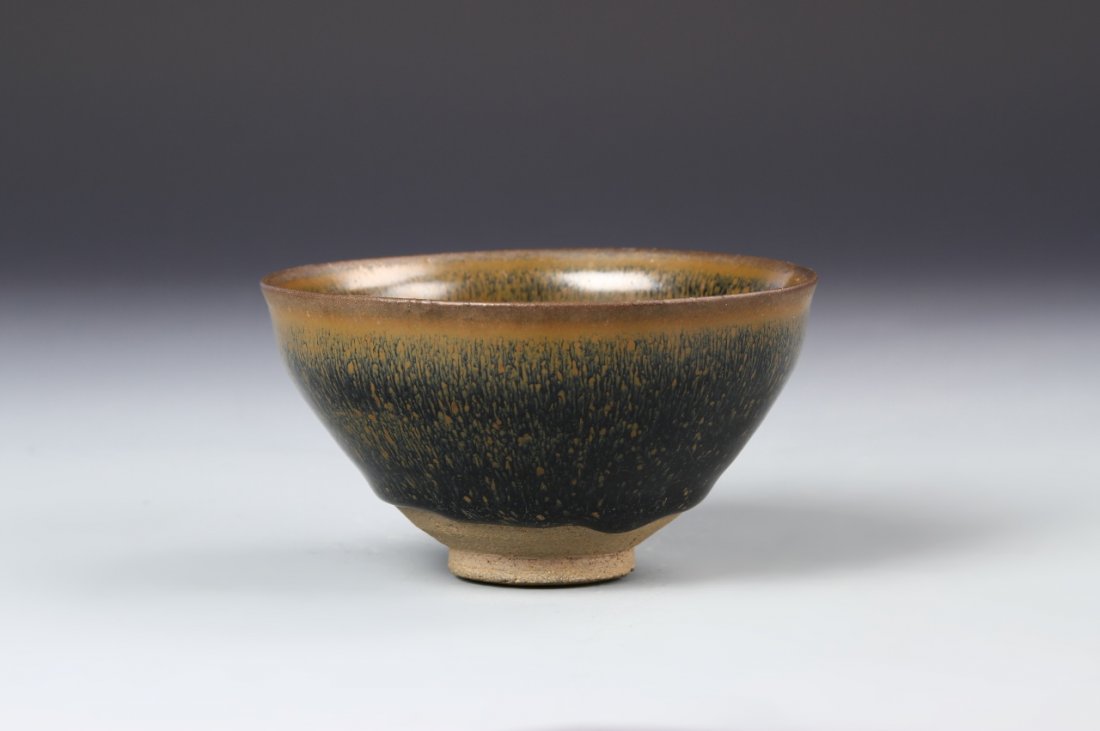 Chinese Jian You Bowl: China, antique Jian You bowl, deep potted dish, high sides tapering to flat base, dark green and brown glaze with lighter brown speckles and rim. Width 4 7/8 in., Height 2 1/4 in.
