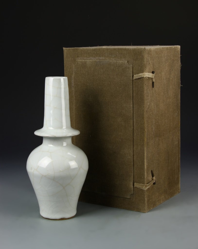 Chinese Jun Yao Vase: China, Song dynasty, Jun Yao vase, small mouth, long neck with a circular base upon wide shoulders, high sides sweeping to flat base, high shine finish with fitted box. Height 11 3/4 in.