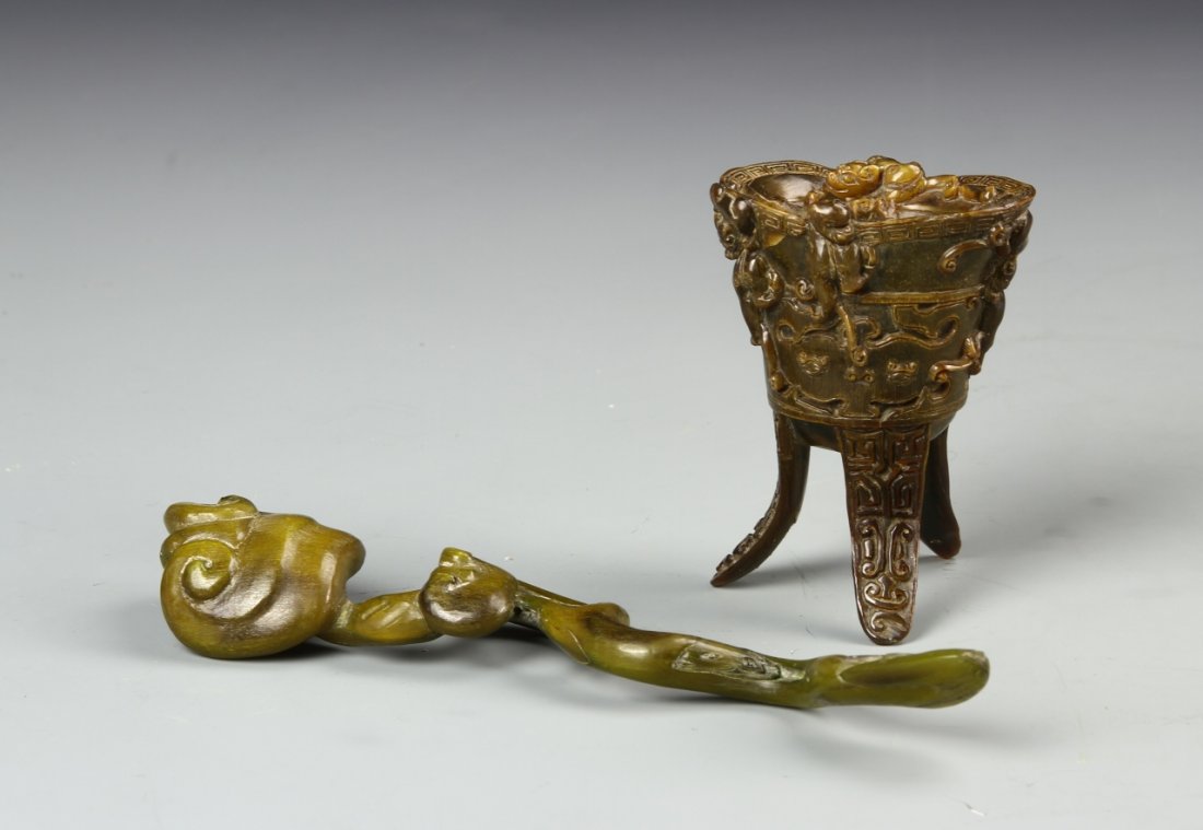 Chinese Horn Censer and Ruyi Scepter: China, horn censer and ruyi scepter, the censer is highly carved with writing on the feet and key fret banding at the rim. Length 6 1/2 in.