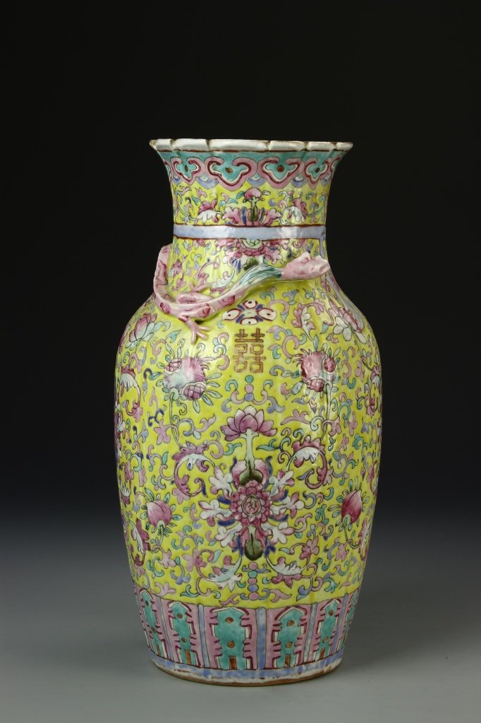 Chinese Famille Rose Export Vase: China, 19th C., Famille Rose export vase, thick, baluster body with flat base and fluted rim, serpents wrapped around shoulders, dense painted decoration throughout. Height 14 1/4 in.