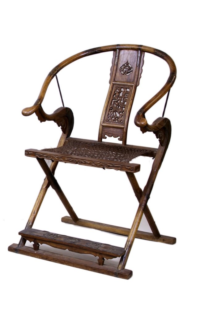 Chinese Antique Hardwood Chair: China, one antique hardwood chair with expertly carved splats showing a hoofed animal motif, naturalistic detailing at the seat and base. Height 41 in.