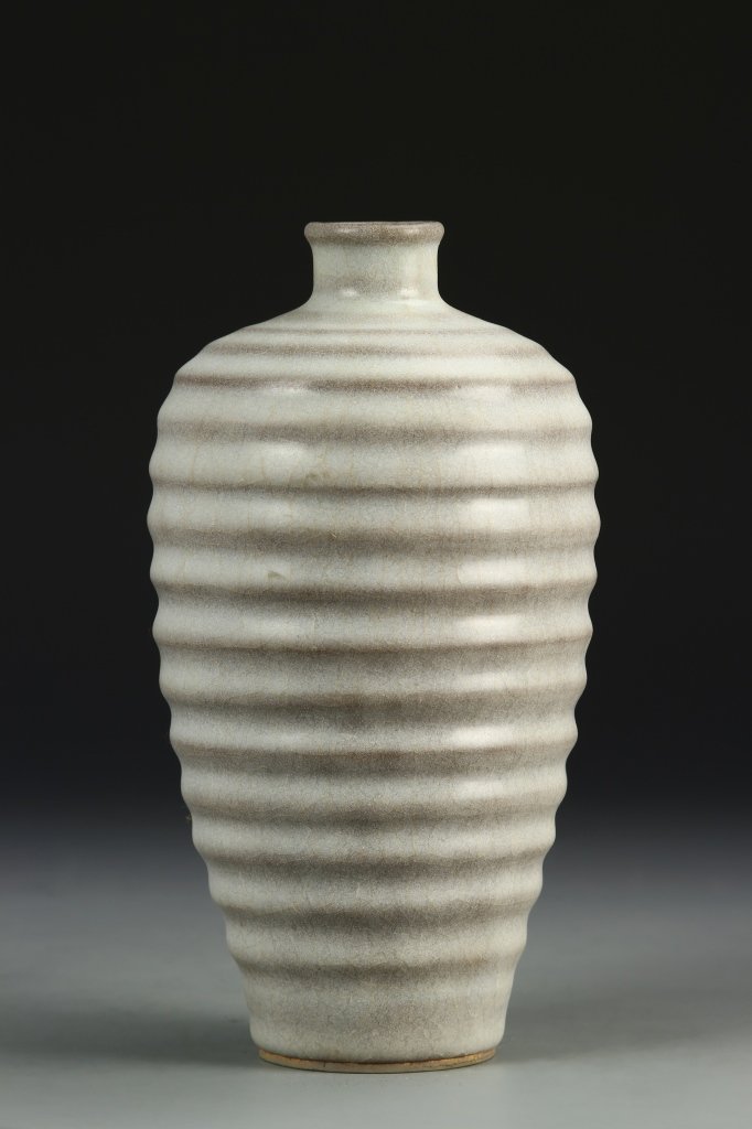 Chinese Guanyao Vase: China, Song Dynasty, Guanyao Meiping vase, small mouth, wide shoulders, tapering sides to flat base with multi channel spiral grain throughout. Height 9 1/8 in. Provenance from collection of Professor
