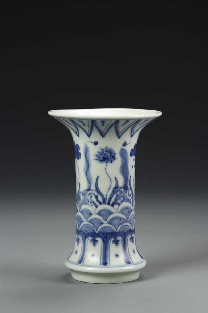 Chinese Blue and White Gu Vase: China, Antique, blue and white Gu Vase, wide flared mouth, straight sides to flared and double layered base, blue decoration of water life with Chenghua mark on base. Height 5 in.