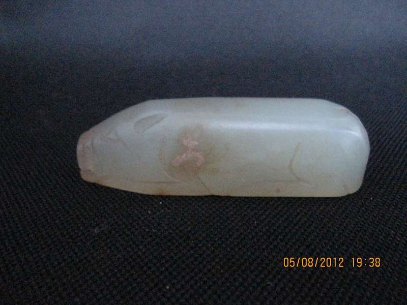Han Dynasty White Jade Pig: white jad pig L:7CM 汉代出代文物。 葬品，玉猪。