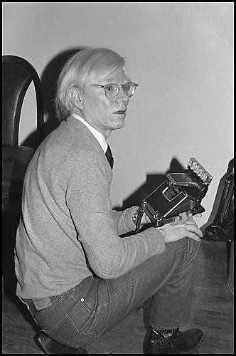 Bobby Grossman, "Andy Warhol with Polaroid SX70, The Fa: Artist Name: Bobby Grossman Title: Andy Warhol with Polaroid SX70, The Factory Year: 1979 Edition: Edition Of 50 Medium: Chromogenic Print On Plexiglas Dimensions: 30h x 20w x 0d in Signe