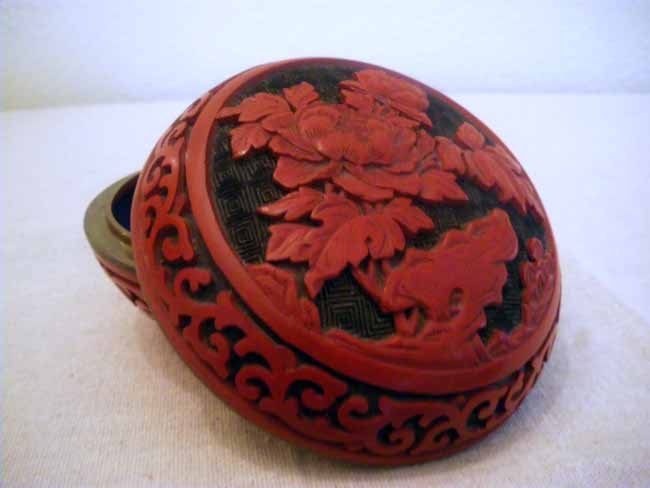 Small Cinnabar Bowl with Blue Enamel Interior: A small yet intricately detailed cinnabar bowl with lid having a dark blue enameled interior, measuring 4 ¼" x 2 ½".
