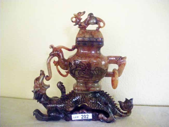 Chinese Carved Red Soapstone Figural Dragon Censor: A nicely carved Chinese red soapstone dragon censor, measuring 9 ¾" tall.
