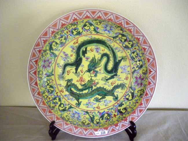 Chinese Imperial Yellow Charger Green Warring Drag: A fine Chinese imperial yellow charger accented with green warring dragons, measuring 17 3/8" Charger.