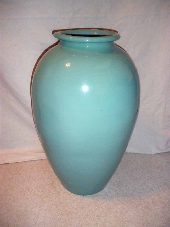 Large Abingdon American Art Pottery Teal Glazed Oi: A large Abingdon American art pottery teal glazed oil jar, measuring 22" high.
