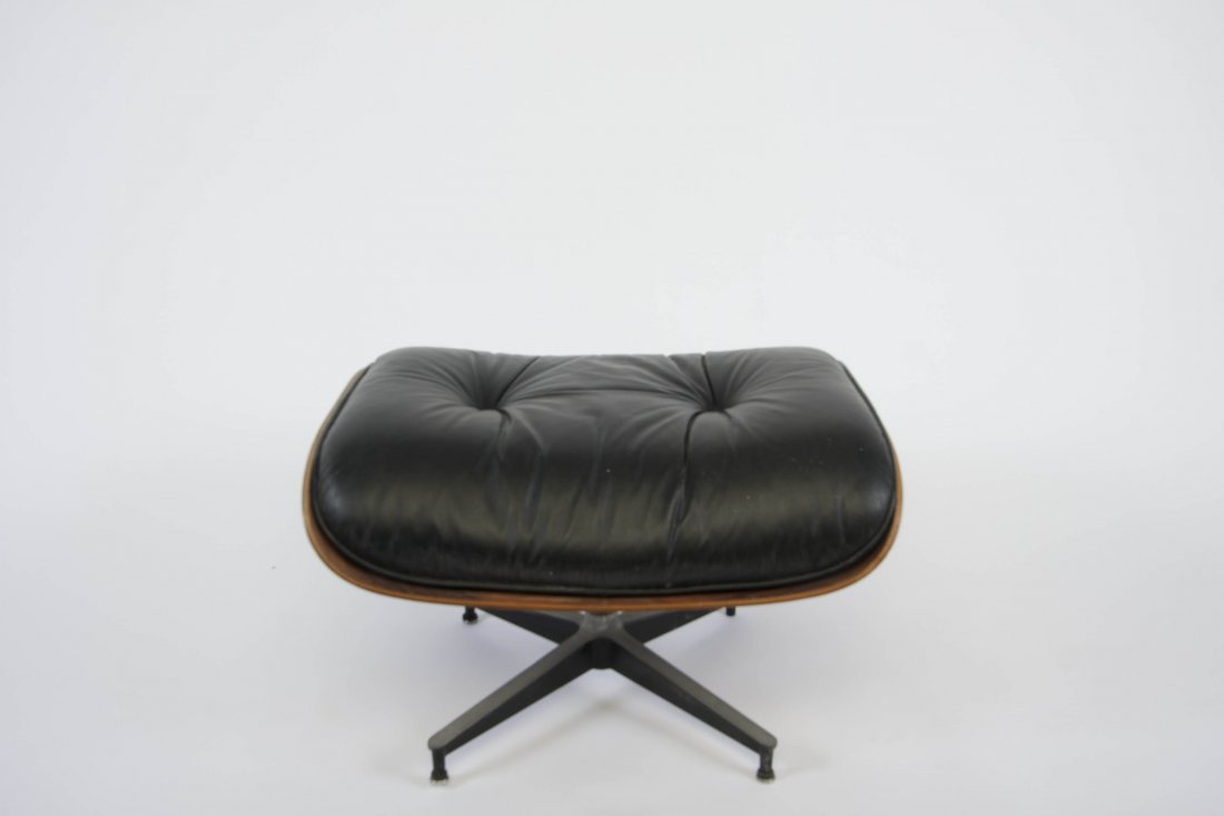Charles Eames Rosewood 671 Ottoman: Black leather and rosewood.