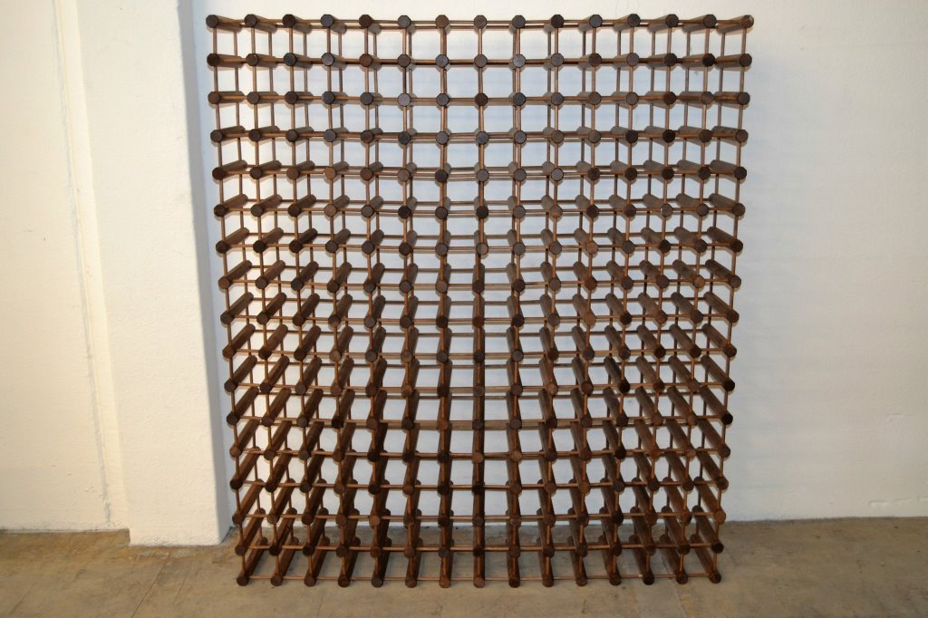 Massive Modernist Wood Wine Rack: 65" Height 57.5" Length 11" DepthOur fantastic auction features Nakashima, Paul Evans, Bertoia, Karl Springer, Pierre Paulin, Dunbar, Robsjohn Gibbings, Eames, George Nelson, Gucci, Lalique, Knoll, Ma