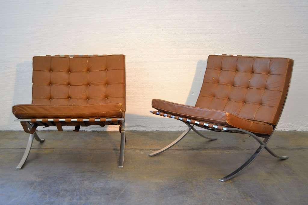 Mies Van Der Rohe for Knoll Barcelona Chairs: Stainless Steel Frames 30" Depth 29.5" Width 29.25" HeightOur fantastic auction features Nakashima, Paul Evans, Bertoia, Karl Springer, Pierre Paulin, Dunbar, Robsjohn Gibbings, Eames, George Nelson,