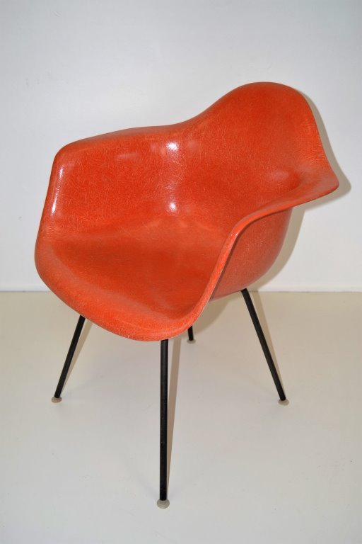 Charles Eames for Herman Miller Fiberglass Chair: Orange 37 in H 25 in W 22.5 in D Seat H 18 in