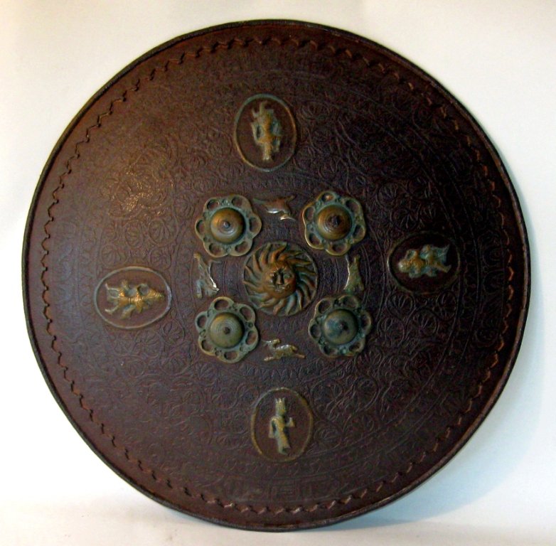 Indo Persian iron and brass shield, 17.5 inch diameter.: Indo Persian iron and brass shield, 17.5 inch diameter. Condition: good.