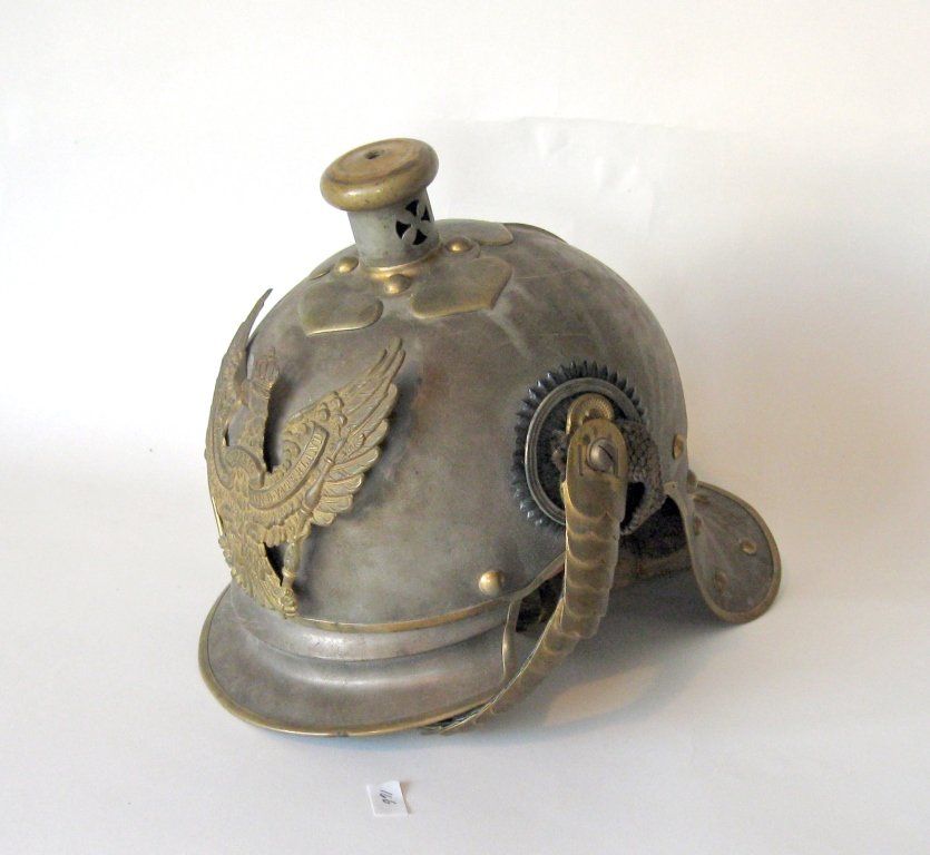 German military helmet, 10 inches tall. Condition:: German military helmet, 10 inches tall. Condition: missing spire.