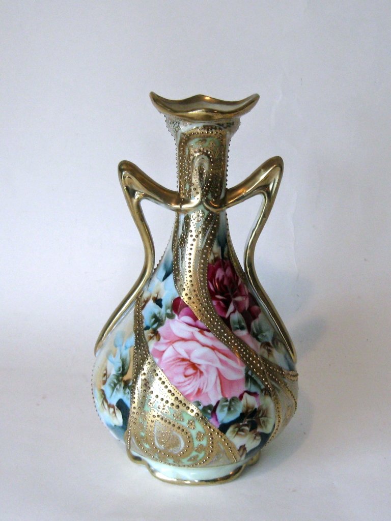 Hand painted Nippon porcelain vase, 10 inches tall.: Hand painted Nippon porcelain vase, 10 inches tall. Condition: good.