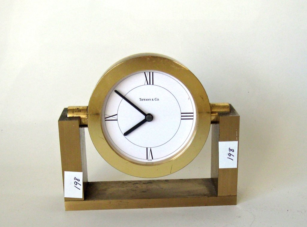 Tiffany & Co. desk clock. Condition: surface: Tiffany & Co. desk clock. Condition: surface discoloration.