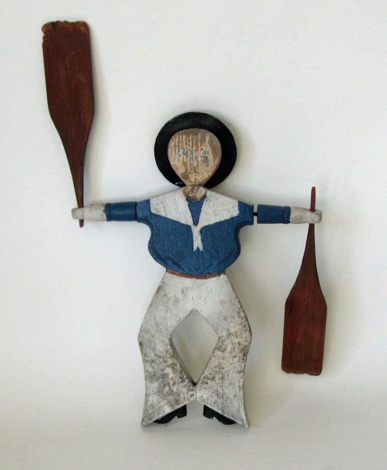 Painted sailor whirligig, 17 inches long. Condition:: Painted sailor whirligig, 17 inches long. Condition: wear.