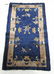 Old Chinese blue filed scatter rug, 45 by 24 inches.