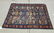 Old Kuba Oriental scatter rug, 61 by 45 inches.