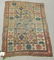 Old Caucasian Oriental scatter rug, 48 by 34 inches.