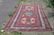 Antique Kazak Oriental rug, 72 by 104 inches.
