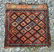 Old Kurdish bag, 26 by 26 inches. Condition: trim loss.