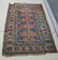 Old Caucasian Oriental rug, 70 by 46 inches. Condition: