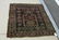 Old Kuba Oriental scatter rug, 58 by 45 inches.