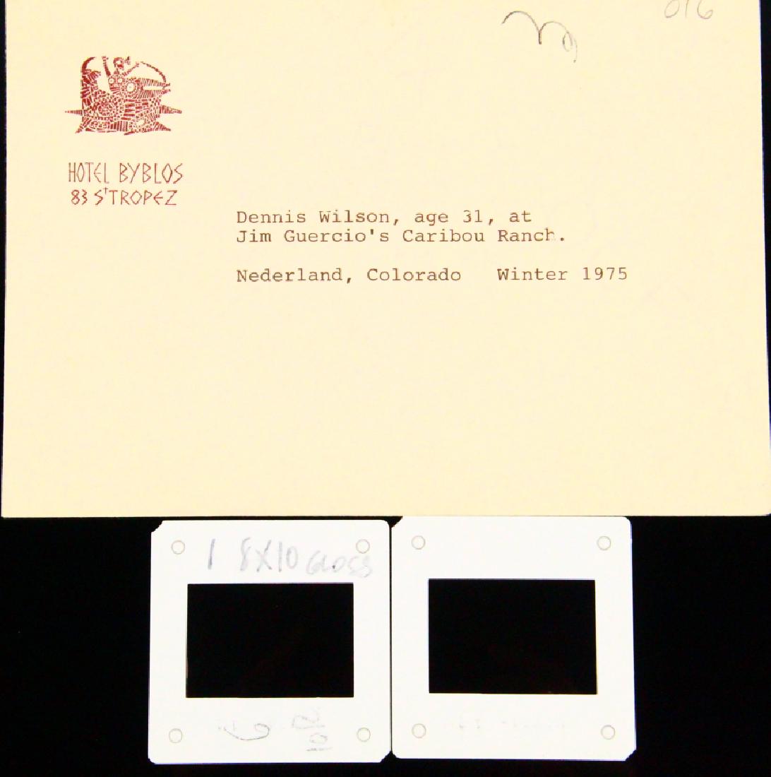 The Beach Boys Dennis Wilson NEVER SEEN Slides: "The Beach Boys" Dennis Wilson (age 31) Winter 1975 NEVER BEFORE SEEN (2) Photo Slides in Hotel Byblos Envelope W/Milton Love's Typed & Handwritten Notes on Envelope & Slides - These two slides are fr