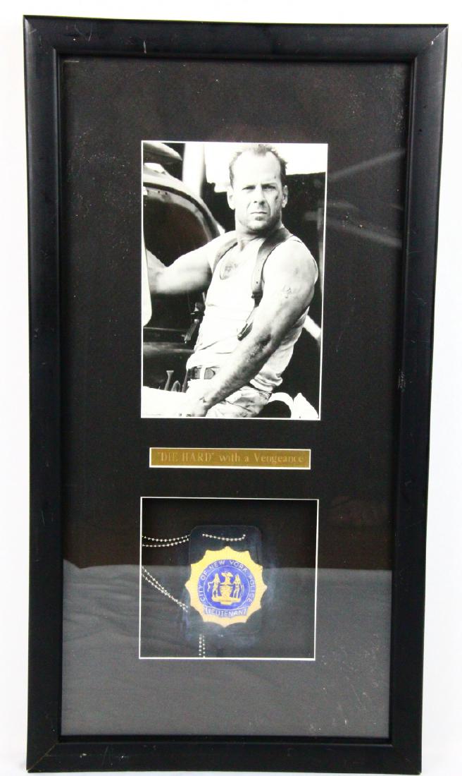 "Die Hard With a Vengance" Bruce Willis Prop/COA: "Die Hard With a Vengance" Film Prop Police Badge Used by Bruce Willis in Framed Presentation W/COA - This lot is a "City of New York Police Lieutennant" prop badge used in the film "Die Hard With a V
