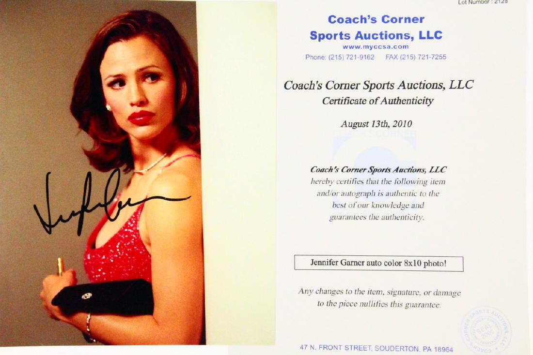 Jennifer Garner Autographed 8"x10" Photo W/COA: Jennifer Garner Autographed 8"x10" Photograph W/COA - This is an autographed, 8"x10" photograph of Jennifer Garner. The photograph pictures Garner in a red, sequin accented gown with a bold red lip. T