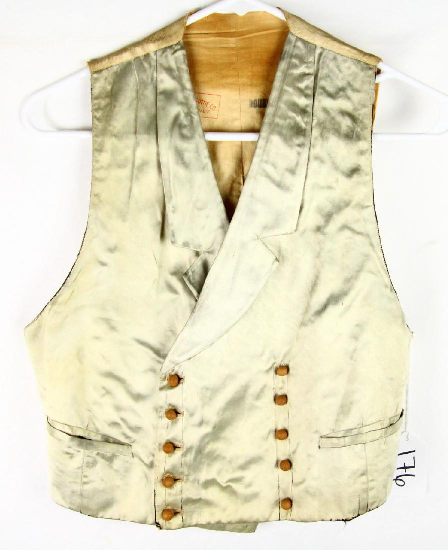 Jackie Coogan Satin Vest W/Wooden Buttons W/COA: Jackie Coogan Light Green Satin Vest W/Wooden Buttons Made by Western Costume Co. W/COA - This piece is a light green, satin vest with wooden buttons. The vest was made for Jackie Coogan, by Western C