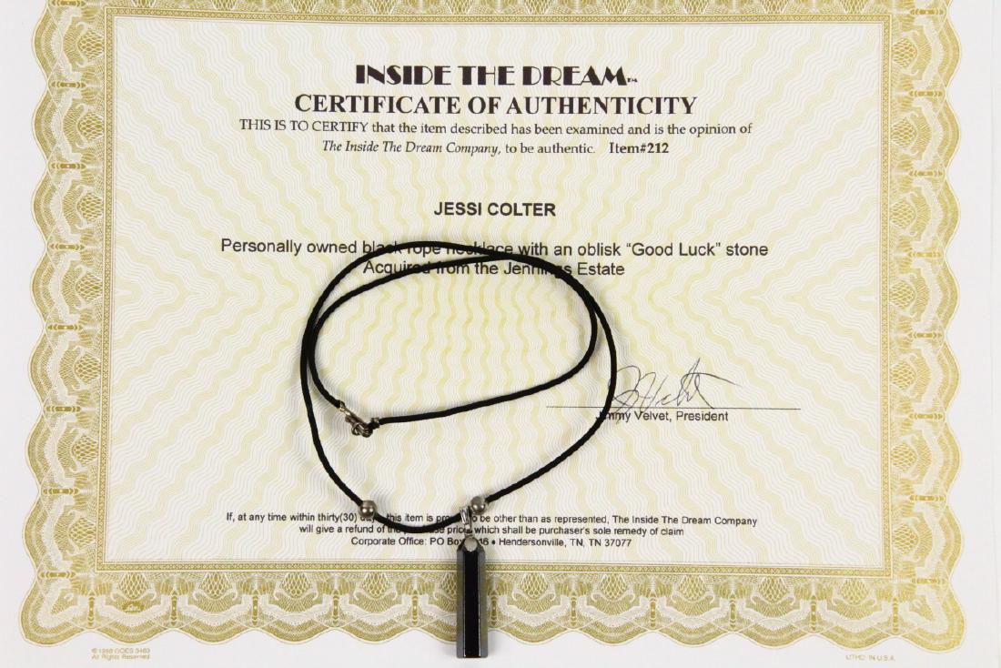 Jessi Colter Black "Good Luck" Necklace W/COA: Jessi Colter Personally Owned Black Rope Necklace W/1.5" Obelisk "Good Luck" Pendant Acquired From the Jennings Estate W/COA - This piece is a black rope necklace with "Good Luck" pendant, personally