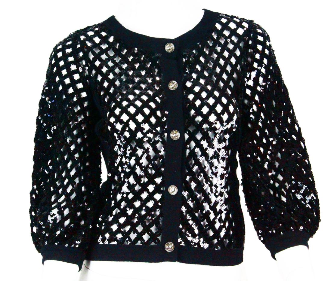 Chanel 2008P Black Lattice Cashmere Cardigan: Chanel 2008 Spring/Summer Black Lattice Woven Cashmere Cardigan W/Sequins - This goregous black Chanel cardigan made its debut as part of Chanel's 2008 Spring/Summer collection. This sweater has a wov