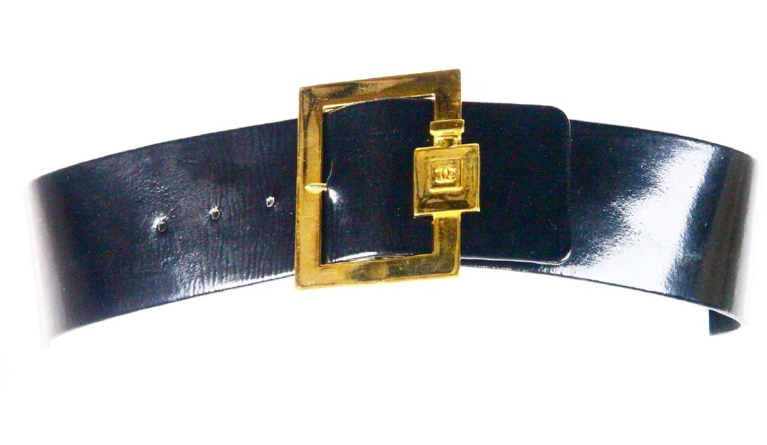Chanel Black Leather Belt W/Perfume Bottle Buckle: Chanel Vintage Black Patent Leather Belt W/Gold Tone Perfume Bottle Buckle - This lovely vintage belt was made by Chanel, and constructed of black patent leather. The belt is finished with a gold tone