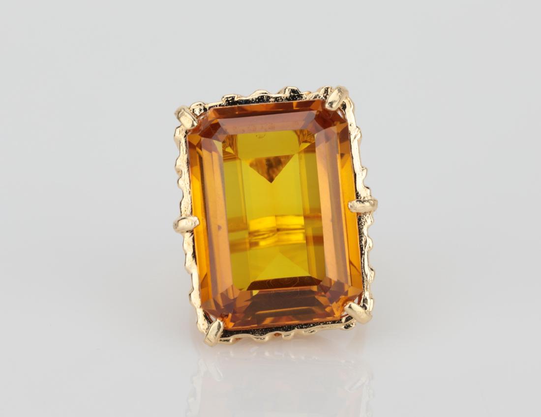 20ct Madeira Citrine & 18K Yellow Gold Ring: 20.00ct Near Flawless Madeira Citrine & Solid 18K Yellow Gold Ring - This beautiful ring is made of solid 18k yellow gold, and boasts a massive 20.00ct (approximate), near flawless Madeira Citrine. Th