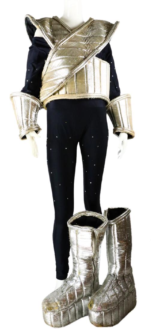 Ace Frehley's "Kiss" Love Gun Tour Spacesuit: Ace Frehley's "Kiss" Love Gun Tour Spacesuit Including Leotard, Platform Boots, Cuffs & Top W/COA - This spectacular piece is a custom made "Spacesuit" costume worn by Ace Frehley during Kiss' Love Gu