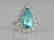 5.44ct GIA Paraiba Tourmaline & 1.1ctw Diamond Ring