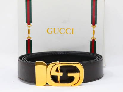 Gucci 1980s GG Logo Chocolate Brown Leather Belt: Gucci Vintage 1980s GG Logo Chocolate Brown Leather Belt W/Box (Never Worn) - This vintage belt by Gucci is an icon of 1980s design. The belt is an ultra soft chocolate brown leather and is finished