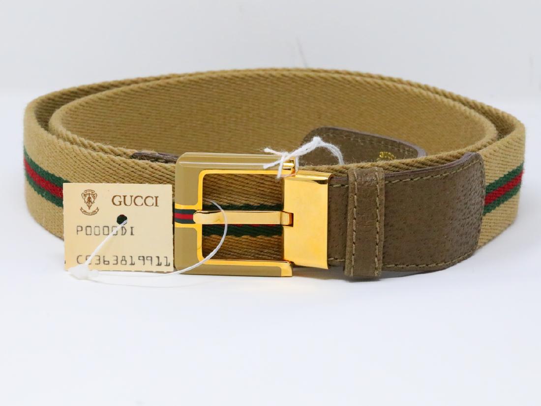 Gucci 1980s GG Web Canvas & Olive Leather Belt: Gucci Vintage 1980s GG Web Canvas & Olive Leather Belt New W/Tag - This vintage belt by Gucci consists of a beige colored canvas decorated with the signature red and green Gucci "web" down the center 