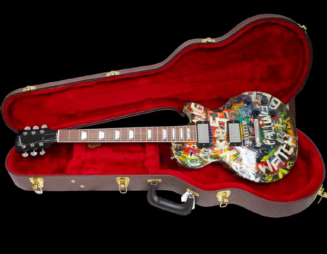 Shawn Mendez Played Guitar Painted by Domingo Zapata: Shawn Mendez Played Gibson Electric Guitar Painted by Domingo Zapata in Hard Case From VH1 Save the Music Foundation - This guitar was played by Grammy Award nominated pop star, Shawn Mendez. The Gibs