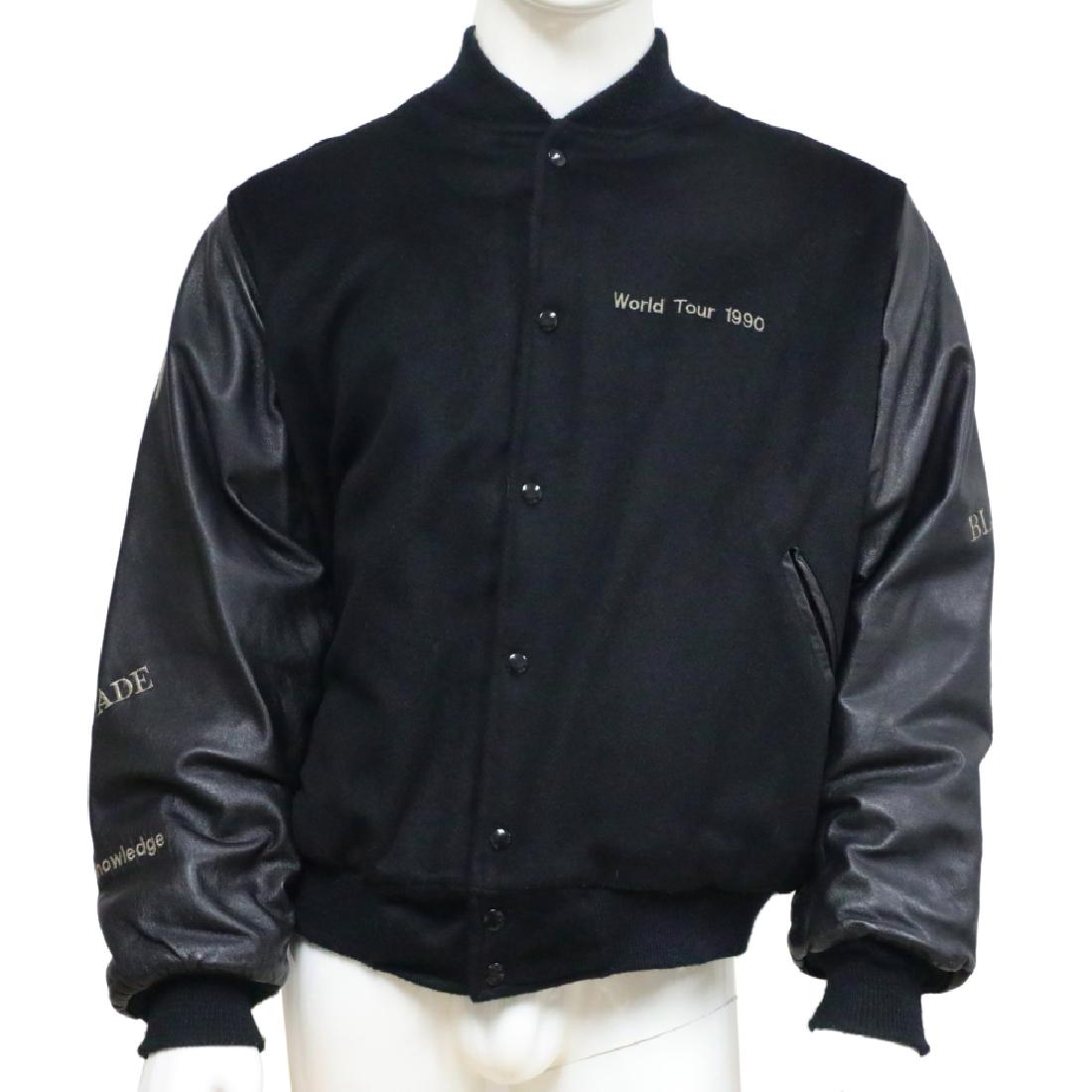 Janet Jackson Rare 1990 Rhythm Nation Tour Jacket: Janet Jackson Rare 1990 Rhythm Nation Black Leather & Wool Tour Jacket - This jacket is a black wool blend with leather sleeves, and was made for Janet Jackson's Rhythm Nation 1990 world tour. The jac