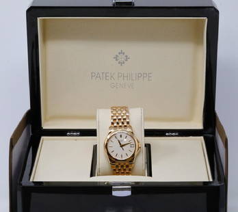 Patek Philippe Calatrava 18K 37mm Watch (5107/1): Patek Philippe Calatrava Solid 18K Yellow Gold 37mm Watch (Ref. 5107/1) W/Patek Piano Wood Box & Extract From the Archives - This stunning, investment quality timepiece was made by one the most