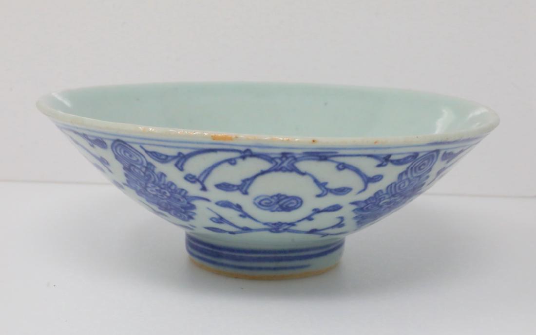 Vietnamese Bleu de Hue Porcelain Conical Bowl: Vietnamese Bleu de Hue Porcelain Conical Bowl W/Archaic Seal Marking (From a Vietnamese Royal Family) - This porcelain bowl is decorated in a vivid blue underglaze with a dense foliate motif. The inte