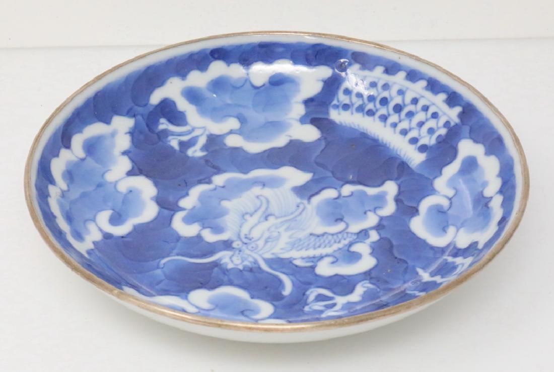 Vietnamese Bleu de Hue Porcelain Dish Marked "Jade": Vietnamese Bleu de Hue Porcelain Dish Marked "Jade" W/Metal Rim (From a Vietnamese Royal Family) - This porcelain dish is elaborately decorated in underglazed blue with an ornate scene of a writhing d