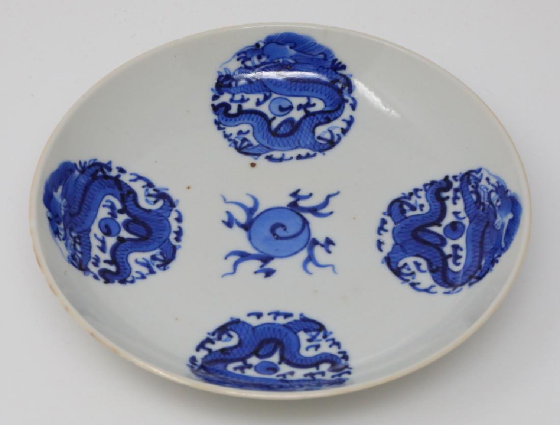 Vietnamese Bleu de Hue Rolling Dragon Dish: Vietnamese Bleu de Hue Porcelain Rolling Dragon Dish Marked "Jade" (From a Vietnamese Royal Family) - This porcelain dish is elaborately decorated in vivid underglazed blue with a four rolling dragons