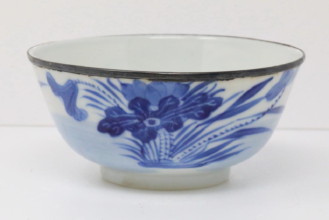 Vietnamese Bleu de Hue Blooming Lotus Rice Bowl: Vietnamese Bleu de Hue Porcelain Blooming Lotus Rice Bowl W/Metal Rim Marked "Jade Trinket" (From a Vietnamese Royal Family) - This porcelain rice bowl is elaborately decorated in vivid underglazed bl