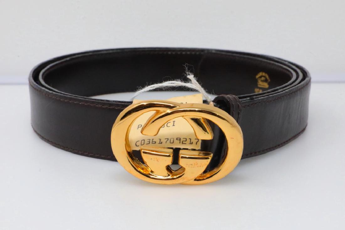 Gucci 1980s GG Logo Brown Leather Belt New W/Tag: Gucci Vintage 1980s GG Logo Chocolate Brown Leather Belt New W/Tag - This vintage belt by Gucci is an icon of 1980s design. The belt is an ultra soft chocolate brown leather and is finished with a 2.2