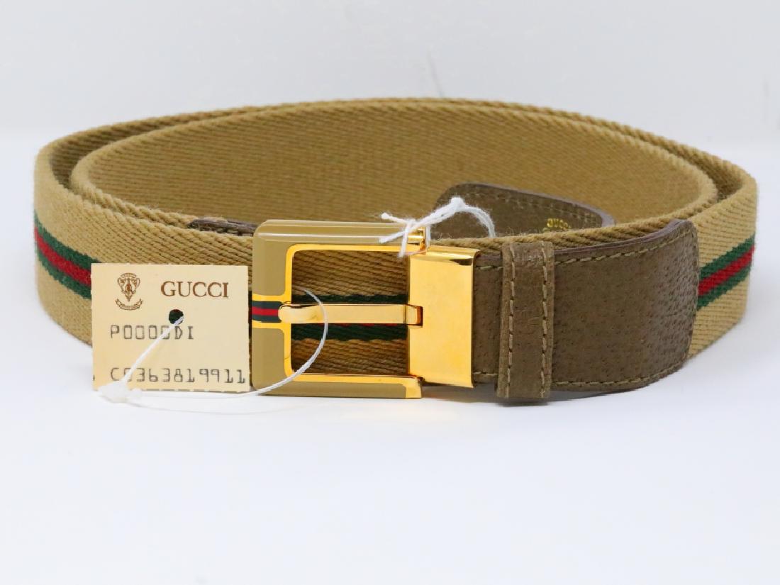 Gucci 1980s GG Web Canvas & Olive Leather Belt: Gucci Vintage 1980s GG Web Canvas & Olive Leather Belt New W/Tag - This vintage belt by Gucci consists of a beige colored canvas decorated with the signature red and green Gucci "web" down the center 